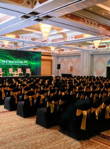 Stage setup for corporate conference in Dubai.