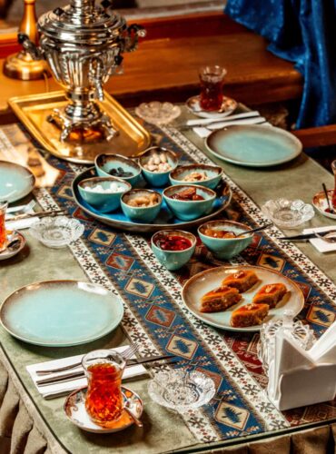 Tea set with baklava, jams and dried fruits for Iftar.