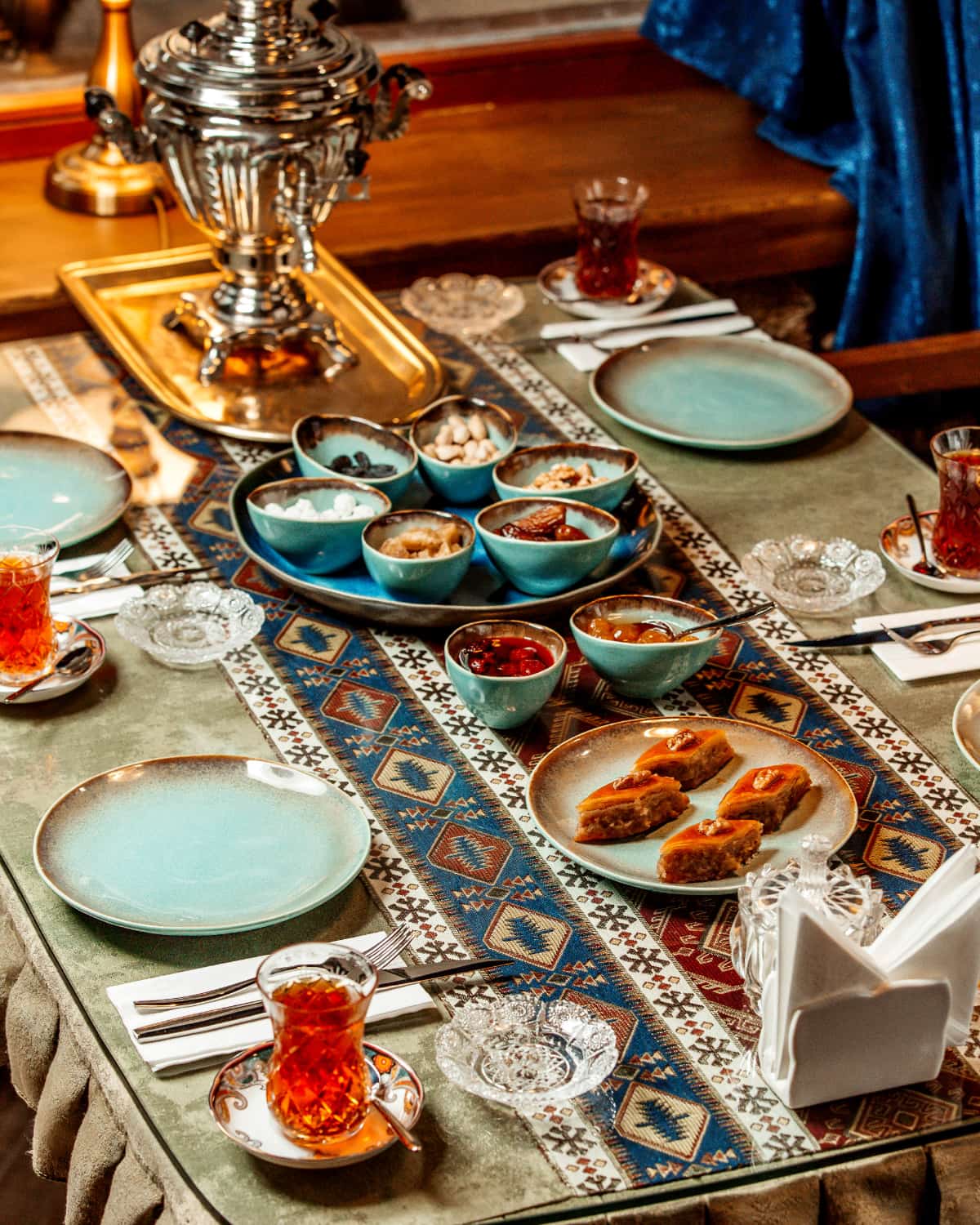 Tea set with baklava, jams and dried fruits for Iftar.