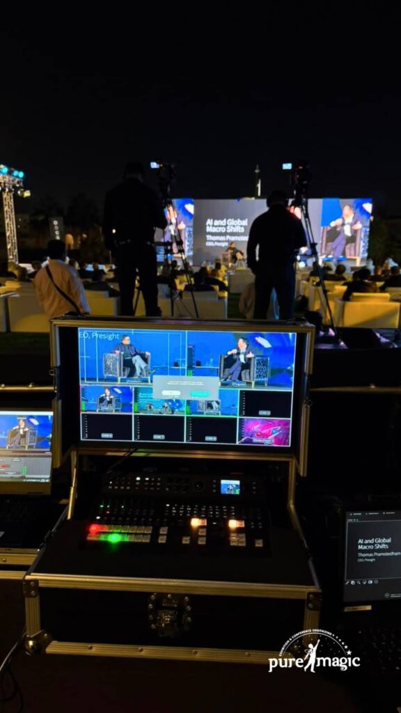A production console displays a multi-camera feed for a live corporate session, illustrating the professional technical oversight required for successful hybrid event production.